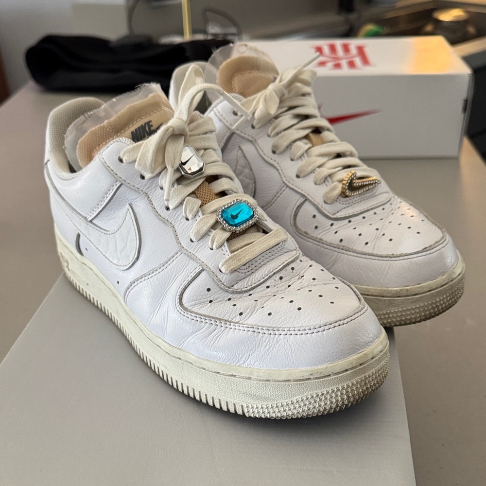 Nike White Low-Top Sneakers with Cream Tongue and Accents
